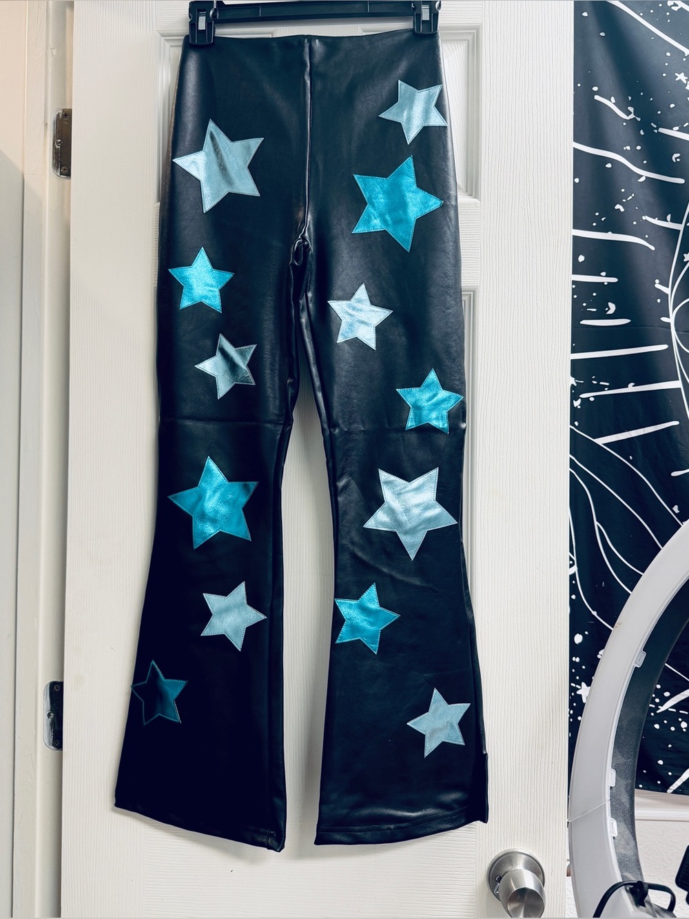NWOT Delia’s SPACEY WAVES VEGAN LEATHER STAR FLARE X
PANTS